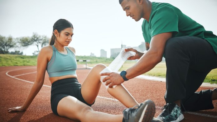 A track runner with an injury as DraftKings debuts a early injury program.