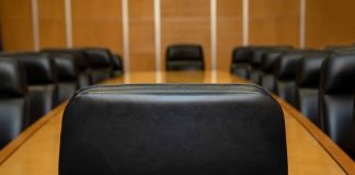 ICRG names ex-Light & Wonder exec Eileen Moore Johnson as board chair A view of a boardroom table from behind the chairperson's seat
