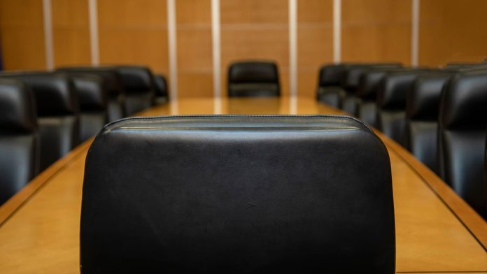 ICRG-names-ex-Light-&-Wonder-exec-Eileen-Moore-Johnson-as-board-chair A view of a boardroom table from behind the chairperson's seat