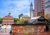 MA rep. files bill to ban sweepstakes as part of online casino legalization A Boston sign with Boston architecture in the background