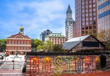 MA rep. files bill to ban sweepstakes as part of online casino legalization A Boston sign with Boston architecture in the background