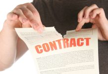 NFL says prediction market sport contracts count as banned betting A person rips up a contract