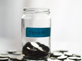 A donation jar as Novig closes a Series A funding round.