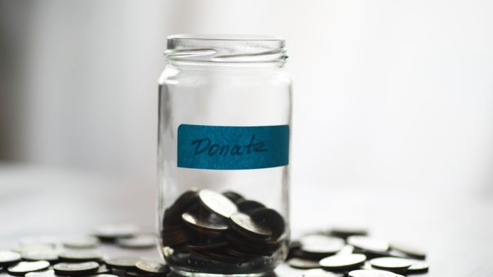 A donation jar as Novig closes a Series A funding round.
