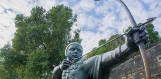 Robinhood sues NJ and NV for right to return sports markets to states Statue of Robin Hood