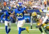 Los Angeles Rams running back Kyren Williams runs the ball versus the Green Bay Packers