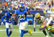 Los Angeles Rams running back Kyren Williams runs the ball versus the Green Bay Packers
