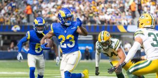 Robinhood kicks off in-app college and pro football event contracts Los Angeles Rams running back Kyren Williams runs the ball versus the Green Bay Packers