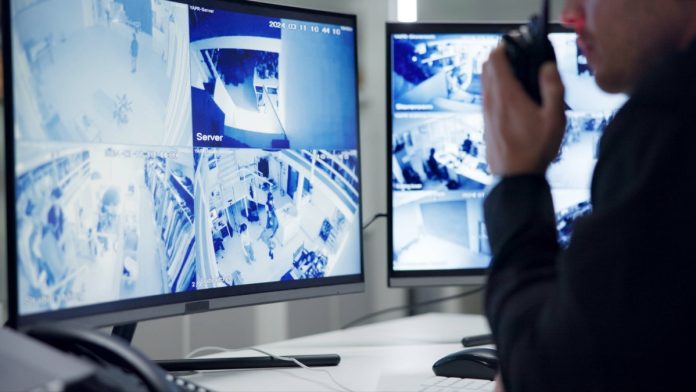 A security guard and cameras as monitoring services provide oversight for gambling.
