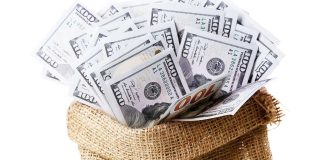 Texas Lottery agrees to pay winner her multi-million dollar jackpot, resolving suit Bag of American cash