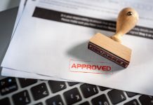 An approval stamp as VGW shareholders approve a buyout to the company's founder.
