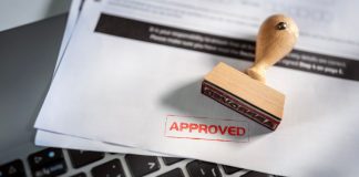 An approval stamp as VGW shareholders approve a buyout to the company's founder.