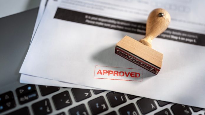 An approval stamp as VGW shareholders approve a buyout to the company's founder.