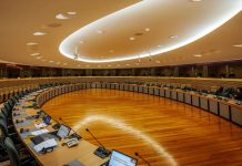 A roundtable in a large meeting hall
