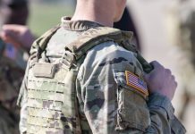 Government not combating military gambling disorders, says auditor A man in US ARMY attire with the American flag on his sleeve