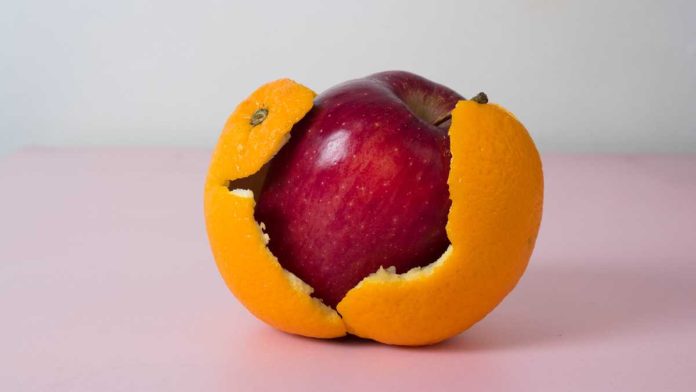 Apple in an orange peel