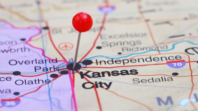 Kansas-debates-sports-betting-changes-with-Missouri-shadow-looming A pin in Kansas City on a map illustrating the border between Kansas and Missouri