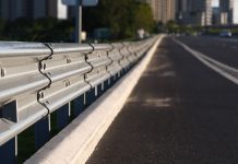 New Jersey to establish mandatory RG standards for operators A guardrail at the side of a highway