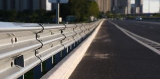 New Jersey to establish mandatory RG standards for operators A guardrail at the side of a highway
