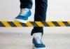 New York lawmaker proposes banning sportsbooks from limiting sharps A person stepping over a barrier intended to limit their movement