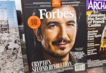 A photo of Robinhood CEO Vlad Tenev on the front cover of Forbes magazine