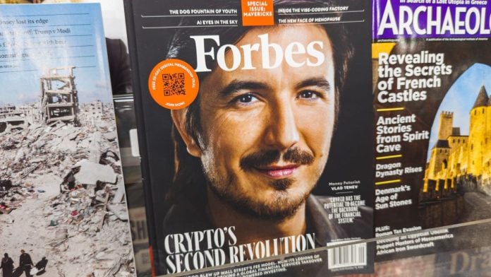 Robinhood-sues-MA-gaming-regulator-and-AG,-says-it-has-no-choice A photo of Robinhood CEO Vlad Tenev on the front cover of Forbes magazine
