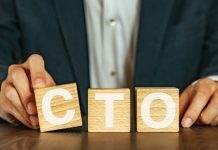 Rush Street Interactive appoints ex-Warner Bros exec as CTO A person holding wooden blocks spelling out CTO, short for Chief Technology Officer