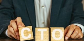 Rush Street Interactive appoints ex-Warner Bros exec as CTO A person holding wooden blocks spelling out CTO, short for Chief Technology Officer