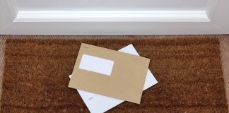 Two letters lying on a doormat