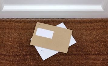 Two letters lying on a doormat