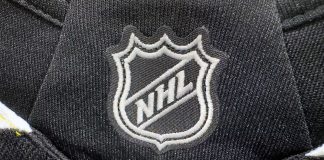 The NHL logo stitched onto a jersey
