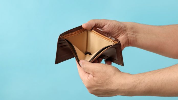 American-Bettor's-Voice-Position-Paper-Gambling-Tax-Deducation Gambling tax deduction paper with empty wallet.