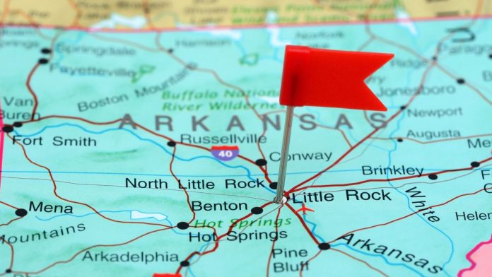 Arkansas-AG-says-prediction-markets-are-illegal-without-betting-license A red flag pinned to Little Rock on a map of Arkansas