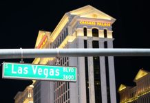 Caesars will not put state licenses at risk over prediction markets A shot of a Las Vegas Blvd street sign with Caesars Palace visible in the background