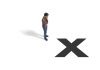 Figurine of a man next to a black X