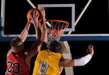 Basketball player blocking shot