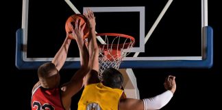 Basketball player blocking shot