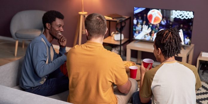 Kambi bettors A group of friends watches sports like bettors would do.