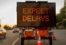 Delay sign as the NCAA delays its rule change on professional sports gambling.
