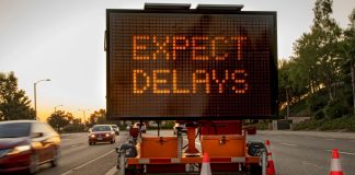 Delay sign as the NCAA delays its rule change on professional sports gambling.