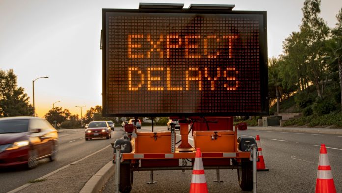 NCAA-Delay-Pro-Sports-Betting-Rule-Change Delay sign as the NCAA delays its rule change on professional sports gambling.