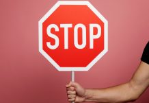 Rhode Island Lottery sends C&D orders to six unlicensed sites Stop sign as the Rhode Island Lottery sends cease and desist orders.