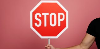 Rhode Island Lottery sends C&D orders to six unlicensed sites Stop sign as the Rhode Island Lottery sends cease and desist orders.