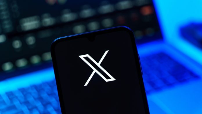 Twitter-X-Partnership-Better-Collective-Launch-Playbook X on a person's phone after signing the social media platform secured a deal with Better Collective.