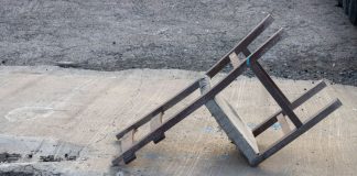 A discarded, upturned chair
