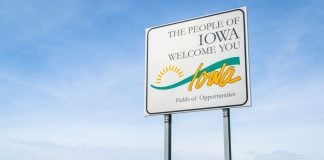 A sign welcoming new entrants to Iowa