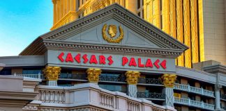 Caesars Palace as the company agrees to a settlement in Nevada.