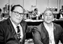 Late former IGA chairman Erne Stevens Jr. with his successor David Bean