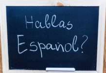 DraftKings debuts Spanish-language functionality for app in US markets A spanish sign as DraftKings embraces the language in the U.S.