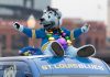 Louie, the mascot of DraftKings' new partner the St. Louis Blues, on top of a bus